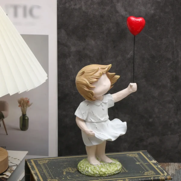 Estátua da Menina com Seu Balão