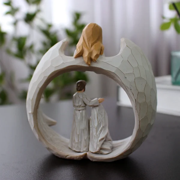 Estátua Anjo e A Sagrada Família
