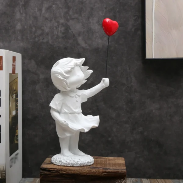 Estátua da Menina com Seu Balão